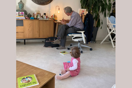 Jason Stoneking writing a portrait of Garance on her first birthday