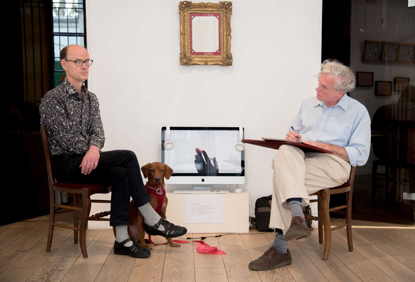 Jason Stoneking writing a portrait of gallerist Arnaud Lefebvre in Paris